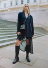 Dolce Vita Neve Convertible Crossbody-Black-Hand In Pocket