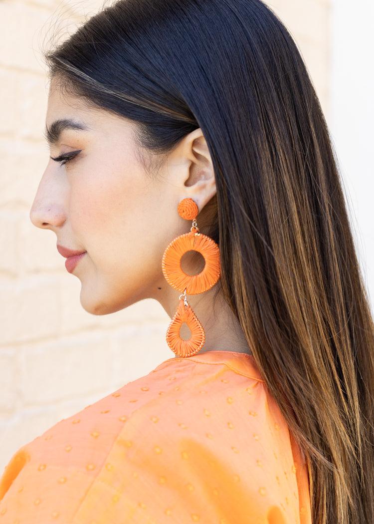 Alani Raffia Drop-Orange-Hand In Pocket