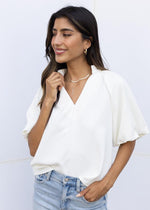 THML Blake Puff Sleeve V-Neck Top-Hand In Pocket
