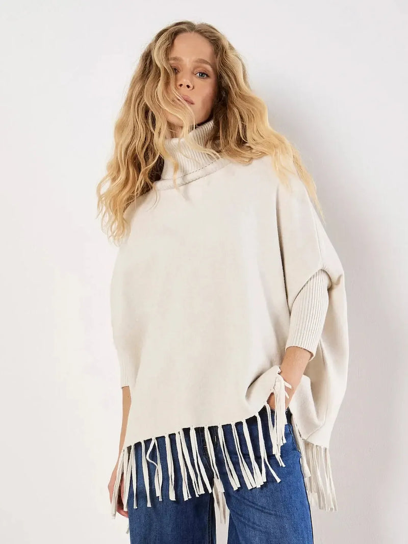 Apricot Roll Neck Fringe Poncho- Cream-Hand In Pocket