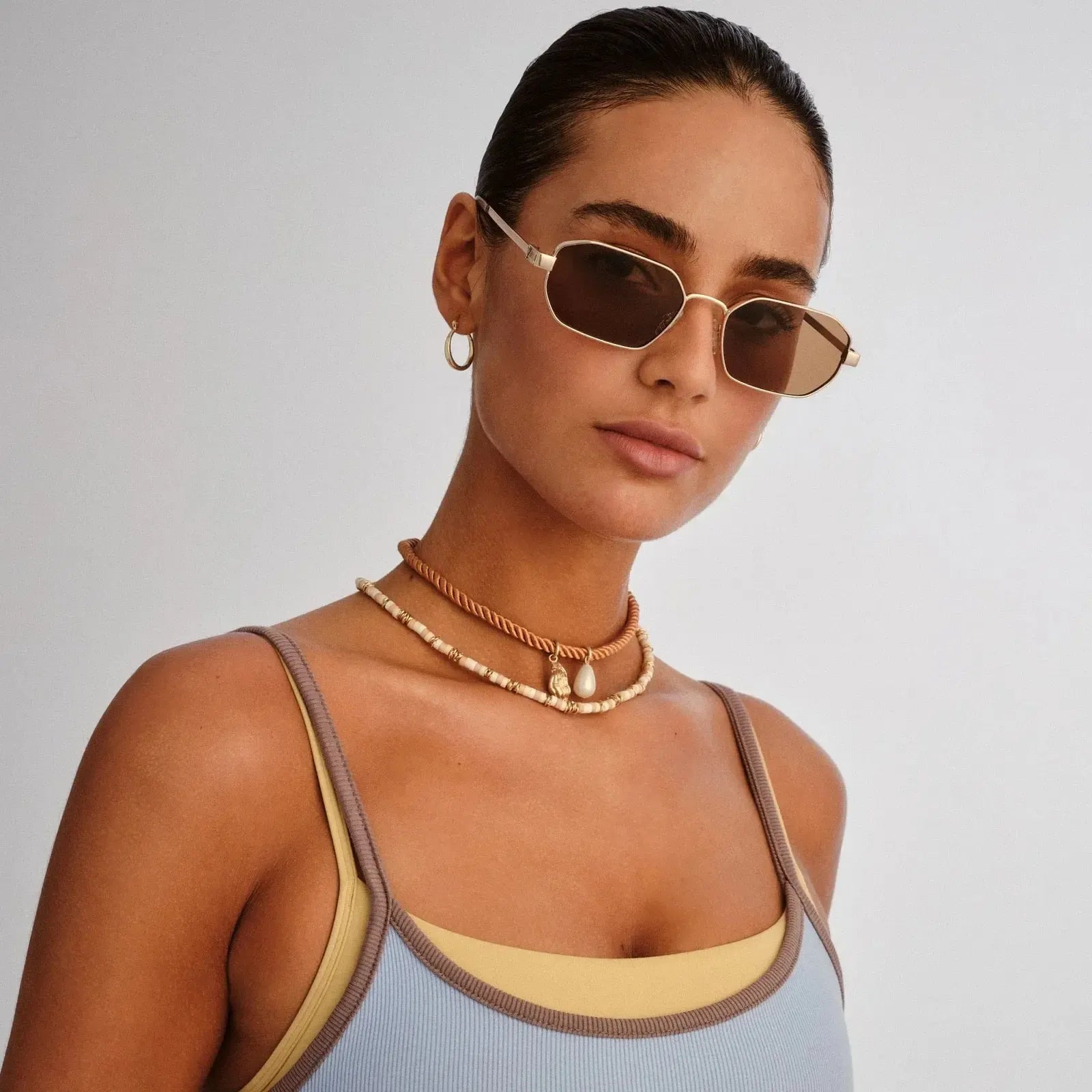 Le Specs Mythic - Gold-Hand In Pocket