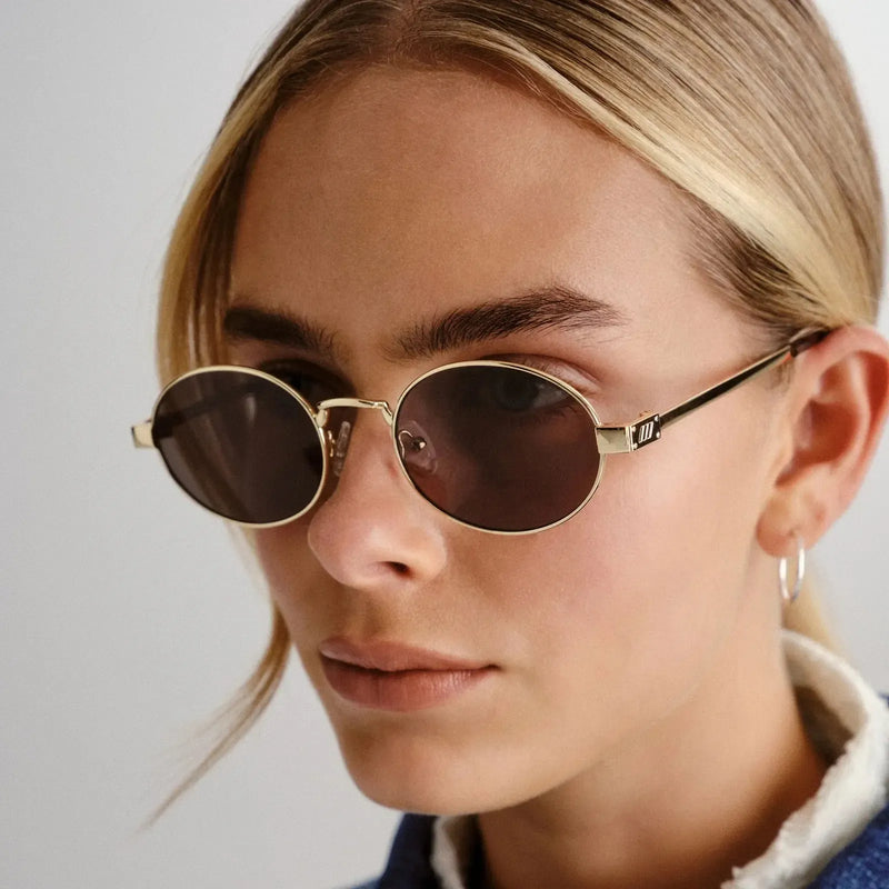 Le Specs Poseidon Deux- Gold-Hand In Pocket