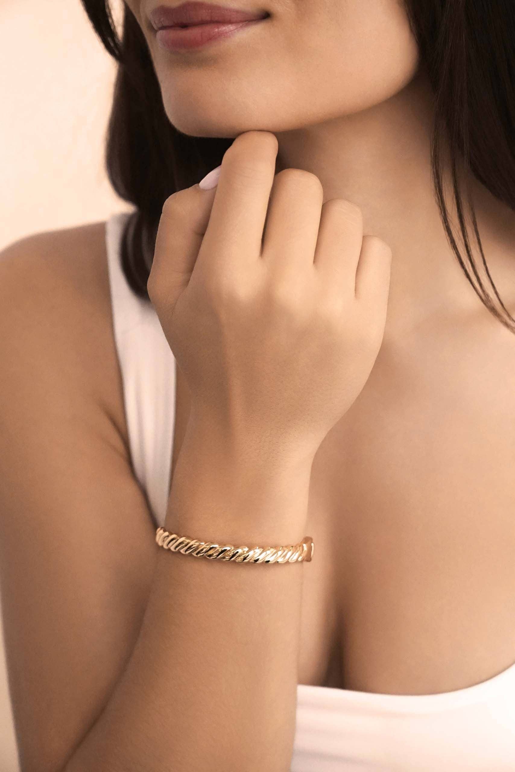 Twisted Stacking Bangle: 18k Gold Plated / One Size-Hand In Pocket