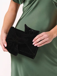 CORA Bow CLUTCH: BLACK-Hand In Pocket