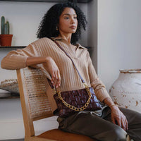 Mimie Olive Recycled Vegan Crossbody Bag-Hand In Pocket