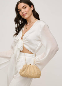 Triana Straw Frame Clutch: Natural-Hand In Pocket