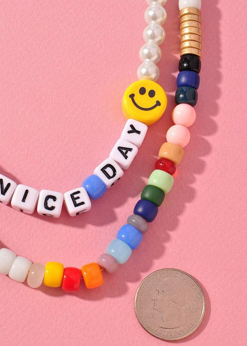 Bonaire "Have a Nice Day"Beaded Loop-Hand In Pocket