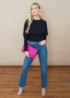 Lena Magenta Lizard Envelope Clutch-Hand In Pocket