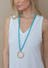 Snug Corner Long Beaded Turquoise Beaded Pendant-Hand In Pocket