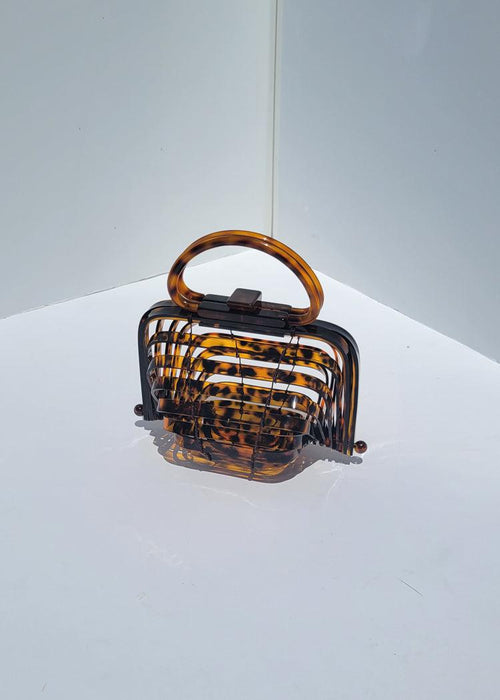 Sienna Acrylic Handbag - Tortoise-Hand In Pocket