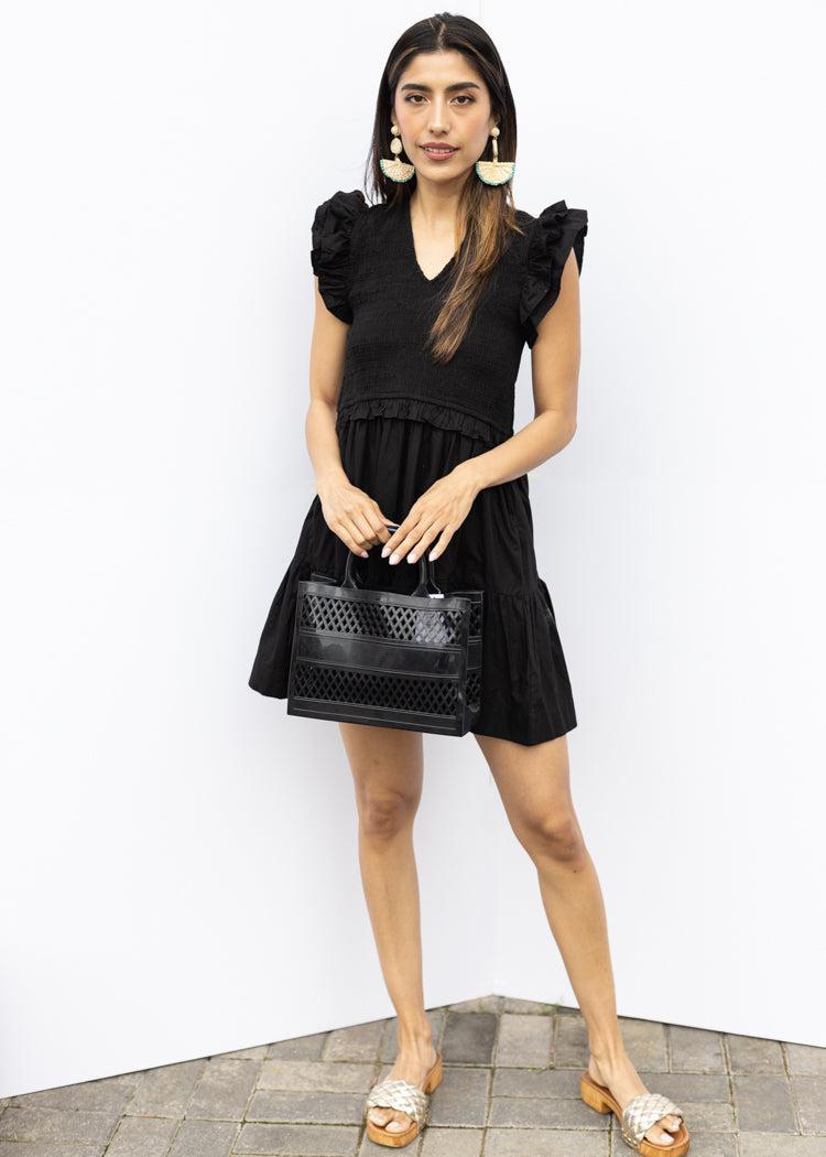 Elan Breezy in Black Dress-Hand In Pocket