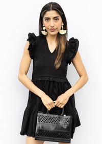 Elan Breezy in Black Dress-Hand In Pocket