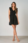 Elan Breezy in Black Dress-Hand In Pocket