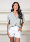 Elan Break Gauze Top-Sage-Hand In Pocket
