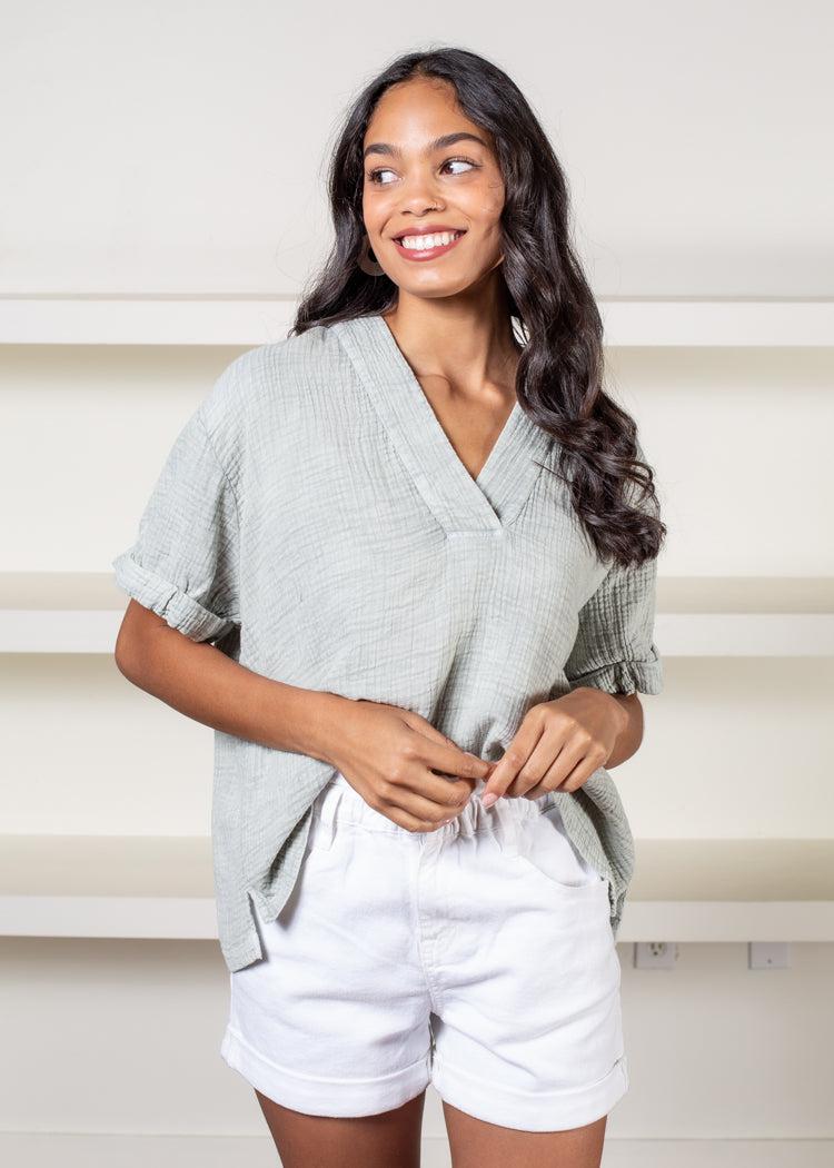 Elan Break Gauze Top-Sage-Hand In Pocket