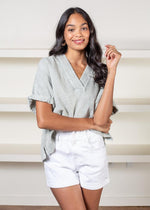 Elan Break Gauze Top-Sage-Hand In Pocket