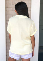 Karlie Cantaloupe Split V Neck Gauze Top- Lemonade-Hand In Pocket