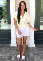 Karlie Cantaloupe Split V Neck Gauze Top- Lemonade-Hand In Pocket