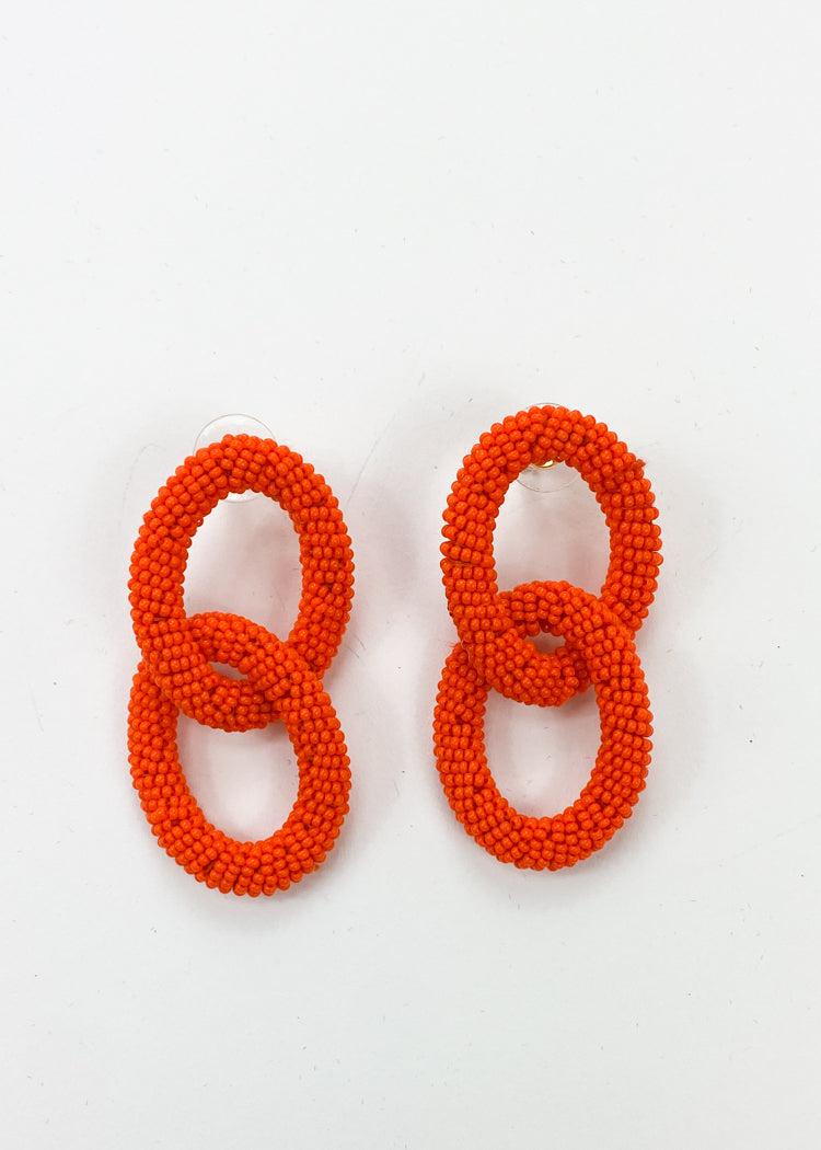 Solmar Link Hoops- Orange-Hand In Pocket