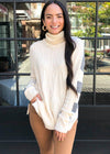 Estes Cableknit Tunic Sweater-Cream-Hand In Pocket