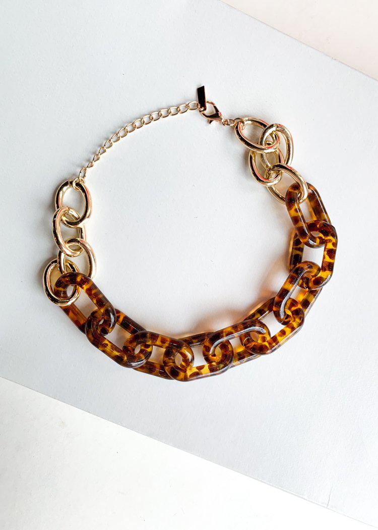 Si Racha Acrylic Gold Tortoise Linked Chain Necklace-Hand In Pocket