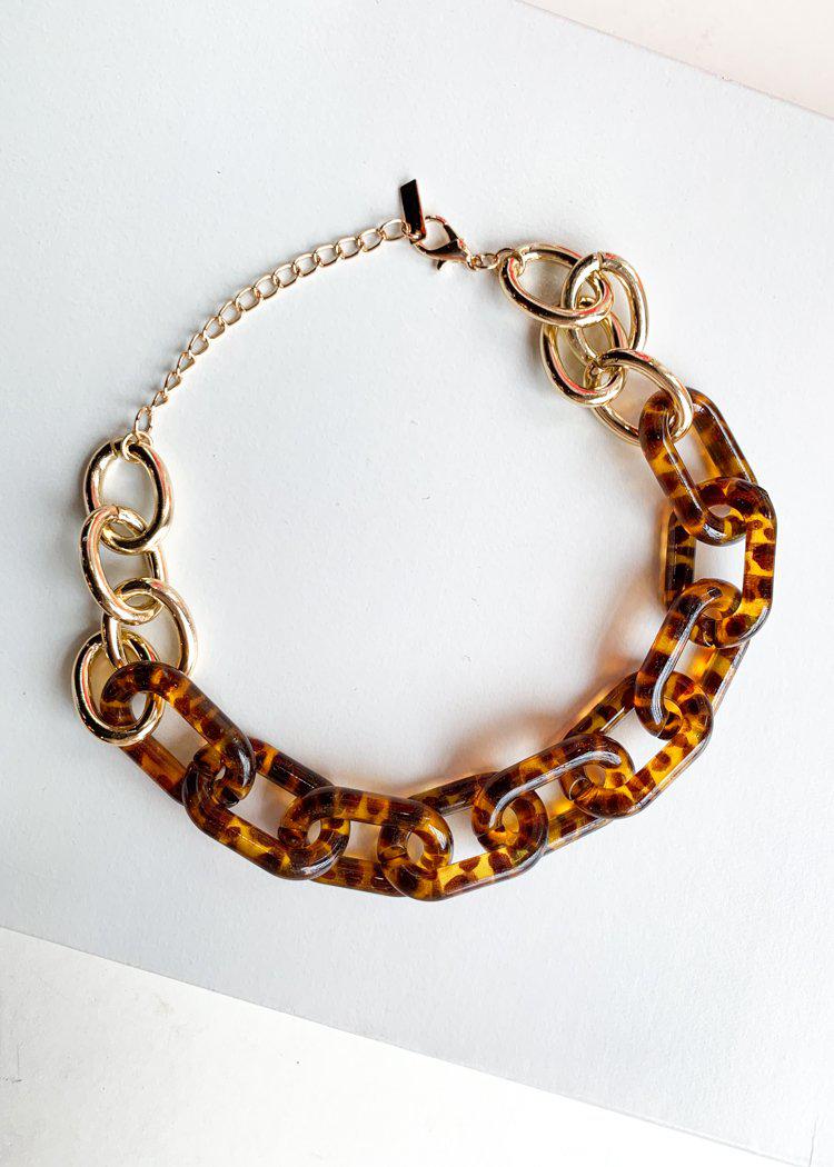 Si Racha Acrylic Gold Tortoise Linked Chain Necklace-Hand In Pocket