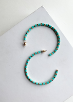 St. Martin Gold and Turquoise Band Loops-Hand In Pocket