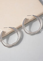 Nora Twisted Hoop-Silver-Hand In Pocket